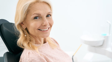 Woman smiling in the dental chair