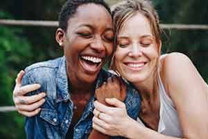 Patient in Springfield smiling with a friend