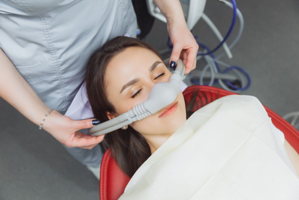 A woman receiving nitrous oxide at the dentist